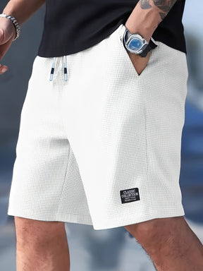 Calções Casuais Masculinos com Textura, Cintura com Cordão, Tecido Leve de Poliéster, Bolsos para Uso Diário, Praia ou Atividades ao Ar Livre | Calções com Cordão | Calções Leves
